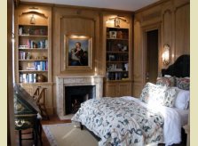 Hallidays stained and waxed pine wood panelled bedroom in a Paris appartment